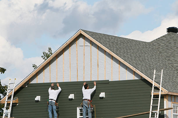 Professional Emergency Siding Repair technician working in Carrsville, VA